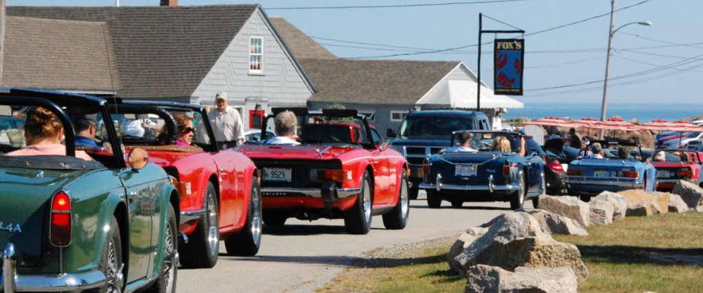 A line of Triumphs sports cars.