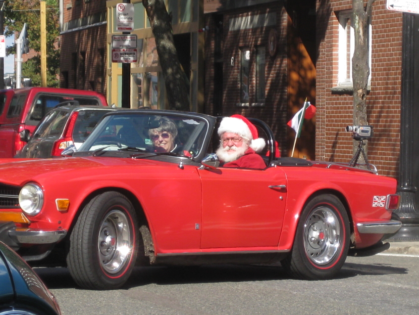 Red TR6 with Santa driving